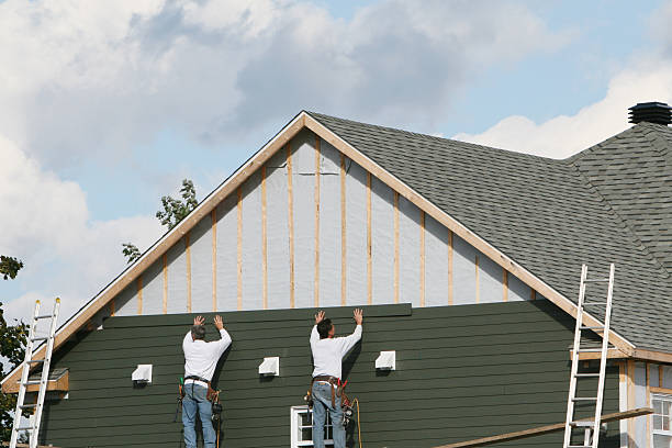 Professional Siding Contractor technician working in Fayetteville, NY